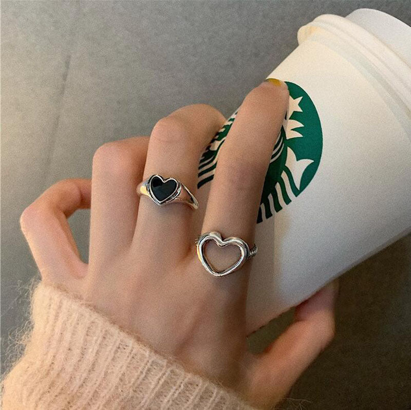 Anillo ajustable de corazón abierto de metal negro al por mayor